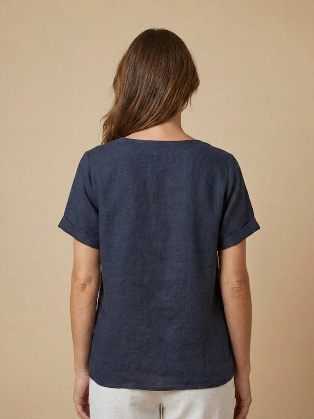 Relaxed fit women's round neck blouse, perfect for summer fashion.