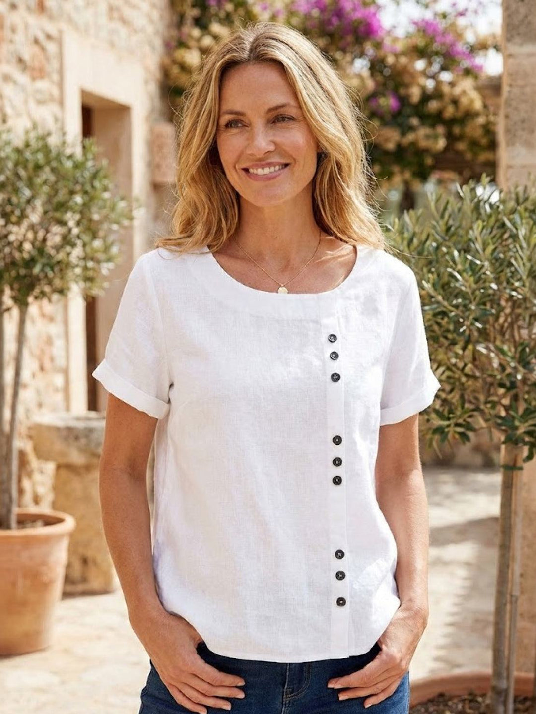 Seasonal women's button blouse, short sleeve and stylish for summer.