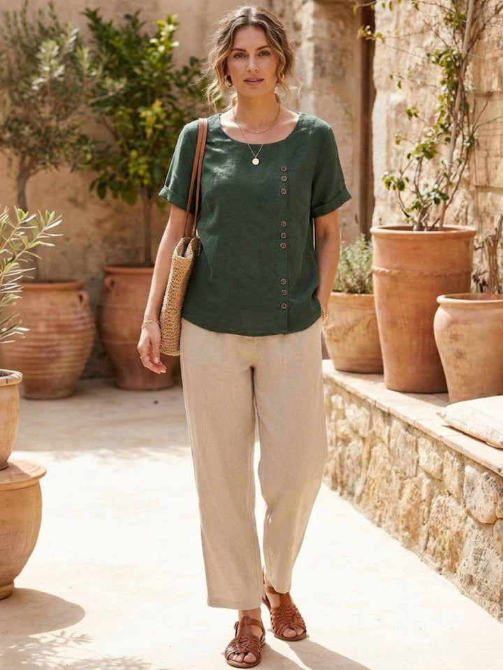 Loose fit women's blouse, a comfortable short sleeve top for warm weather.