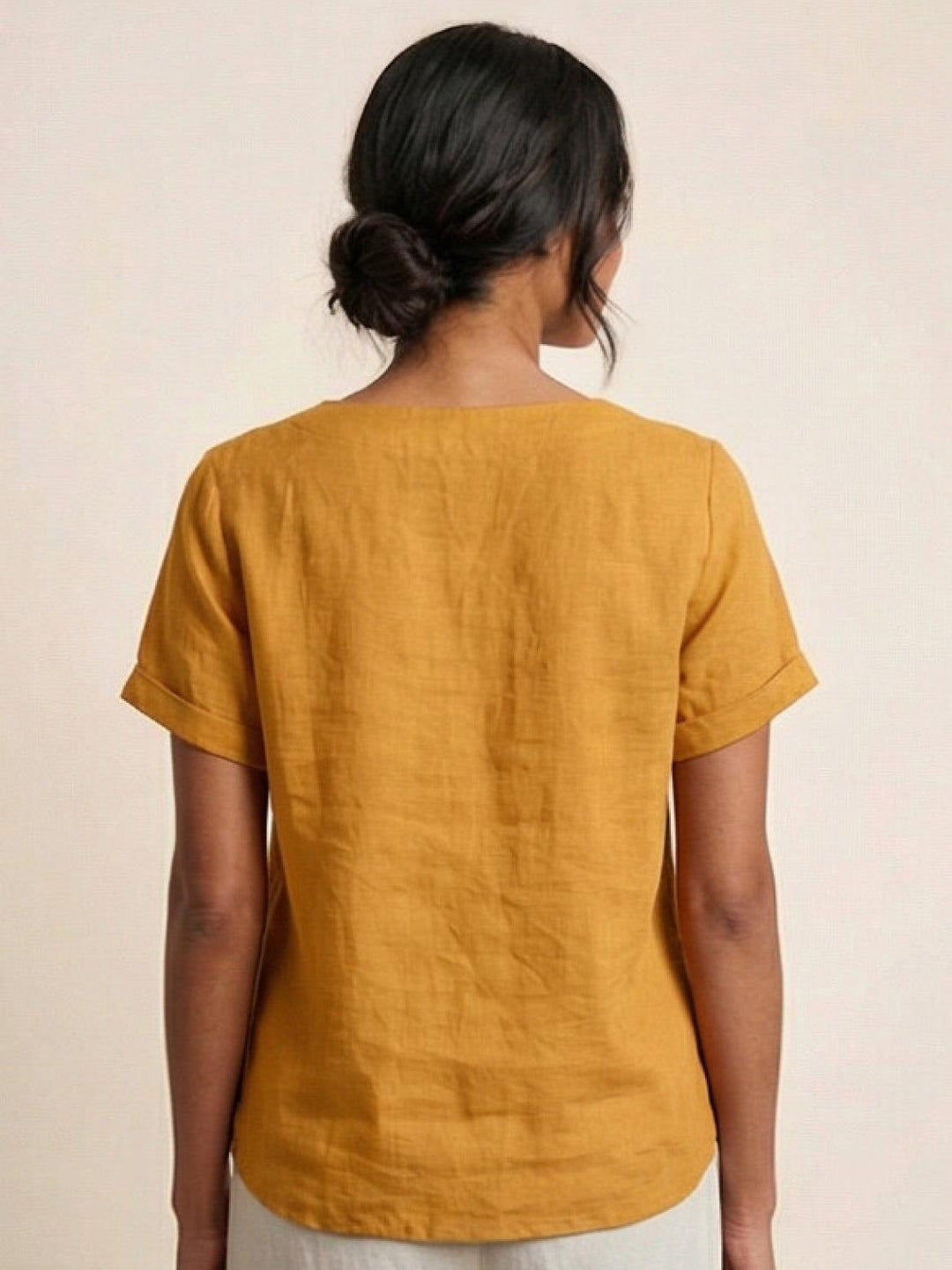 Effortless women's summer fashion blouse, button-up for everyday style.