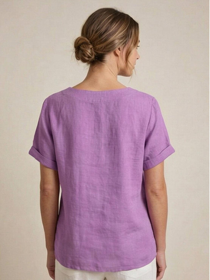 Casual women's button-up blouse, short sleeve for effortless summer days.