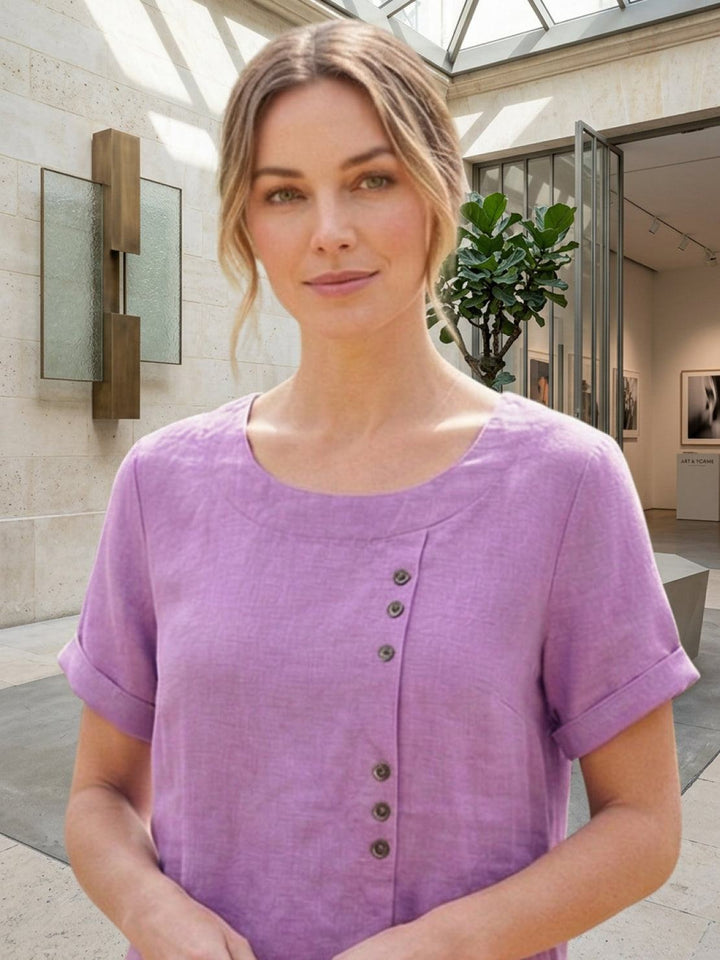 Effortless women's short sleeve blouse, button-up for summer fashion.