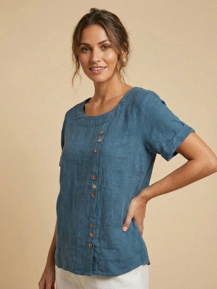 Relaxed women's round neck blouse, a button-up top for effortless summer style.