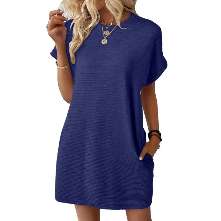 Versatile women's casual summer dress with a round neck. Comfortable midi length, great for warm weather everyday style.