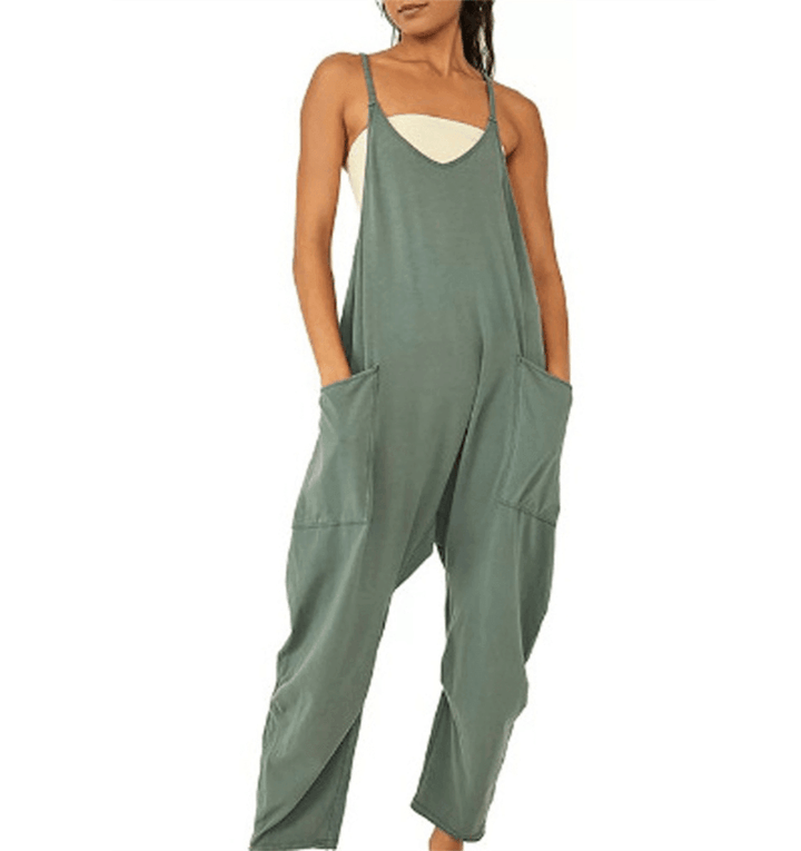 Women's effortless sleeveless jumpsuit in black with pockets, perfect for casual summer wear.