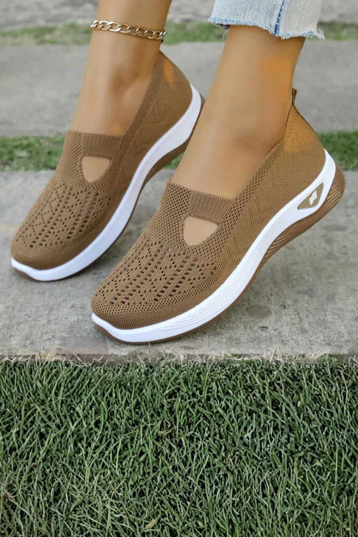 Interior view of women's cushioned slip-on trainers, showing soft, comfortable support.