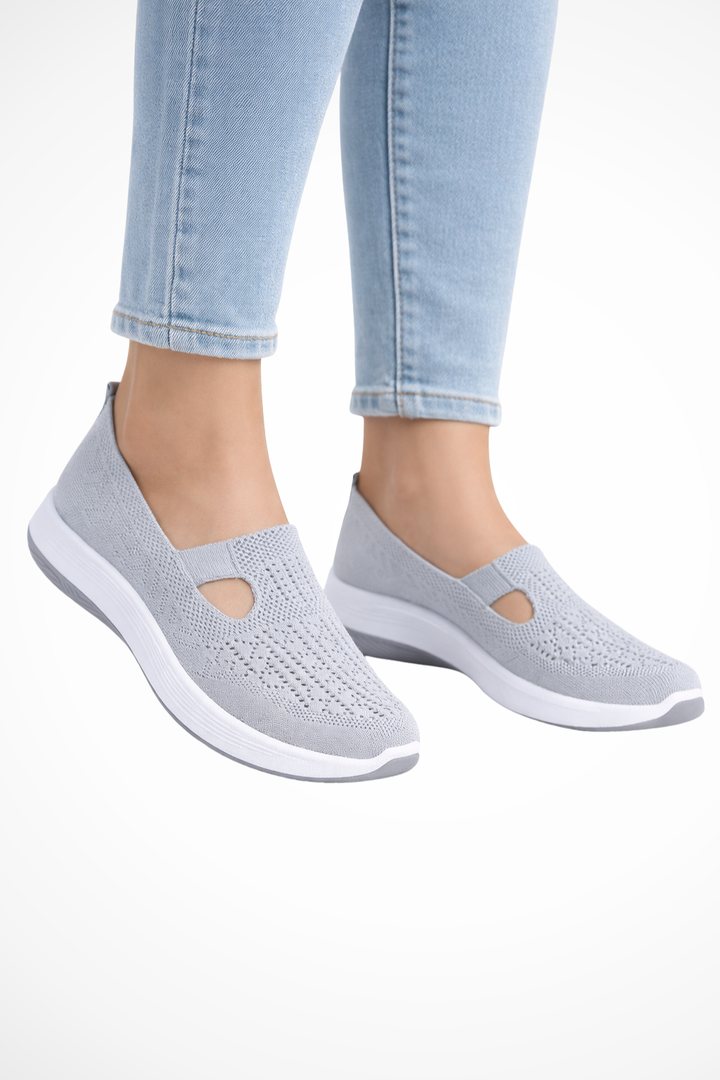 Pair of women's comfortable slip-on trainers, ready for everyday wear & effortless style.