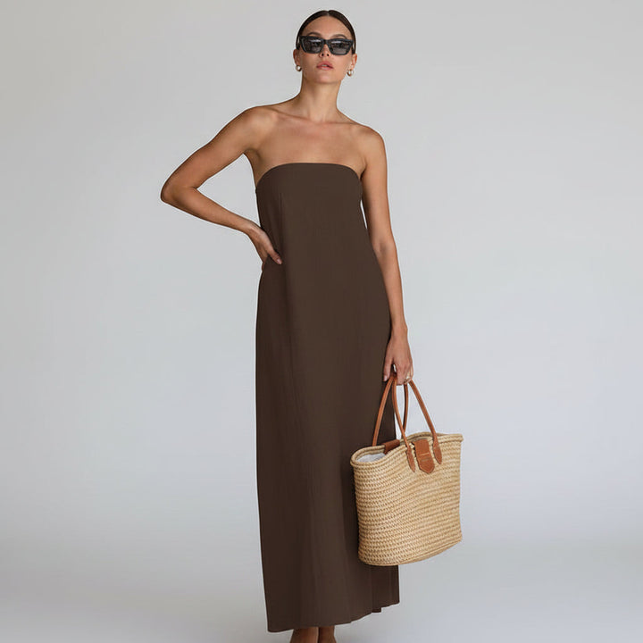 Chic women's flowy strapless maxi dress, ideal casual elegance for summer days.