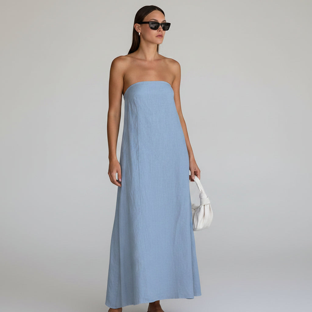 Effortless chic women's strapless maxi dress, flowy design for a stylish summer look.