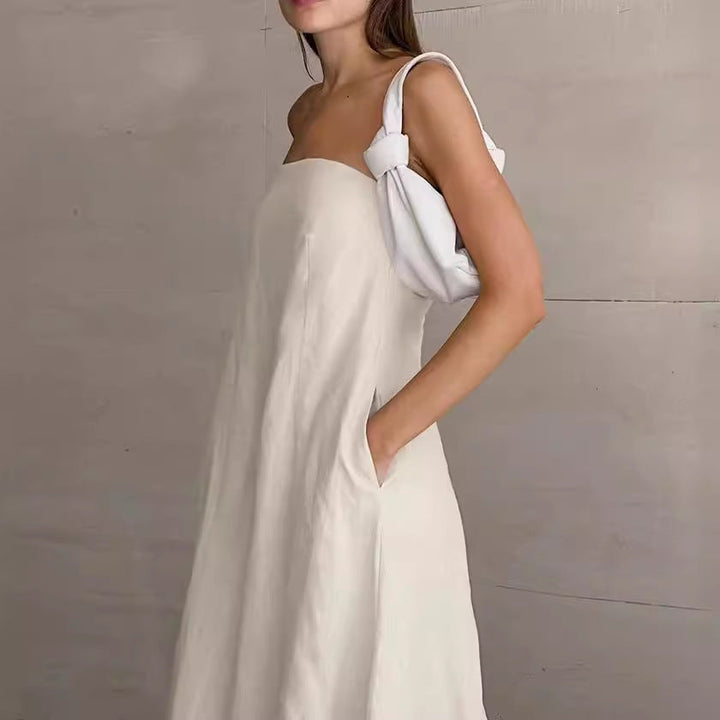 Elegant yet casual women's strapless maxi dress, with a loose, flowy fit for warm weather.