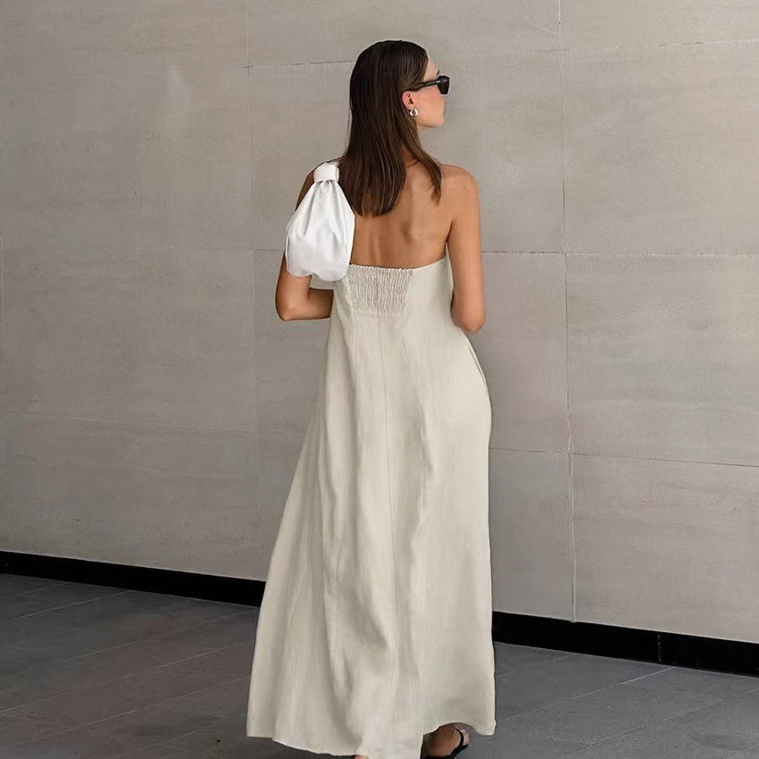 Relaxed fit women's strapless maxi dress, chic and flowy, ideal for summer vacation outfits.