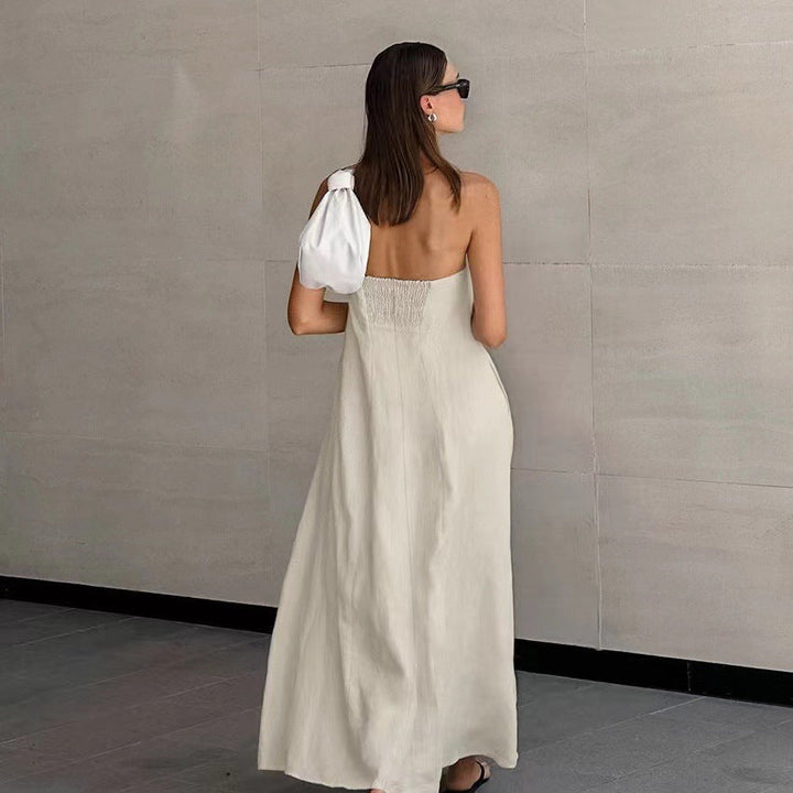 Relaxed fit women's strapless maxi dress, chic and flowy, ideal for summer vacation outfits.
