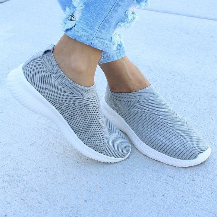 Lightweight & breathable women's slip-on sneakers, perfect for casual athleisure style.