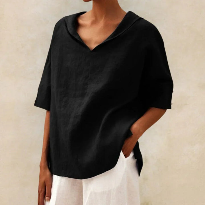 Elegant women's long sleeve button-down shirt. Versatile for casual summer fashion or chic spring workwear.