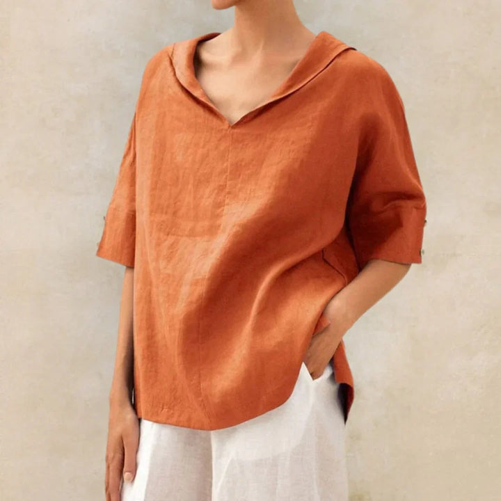 Stylish women's button-down for vacation wear. Light, relaxed fit top, ideal for beach style & summer outfits.