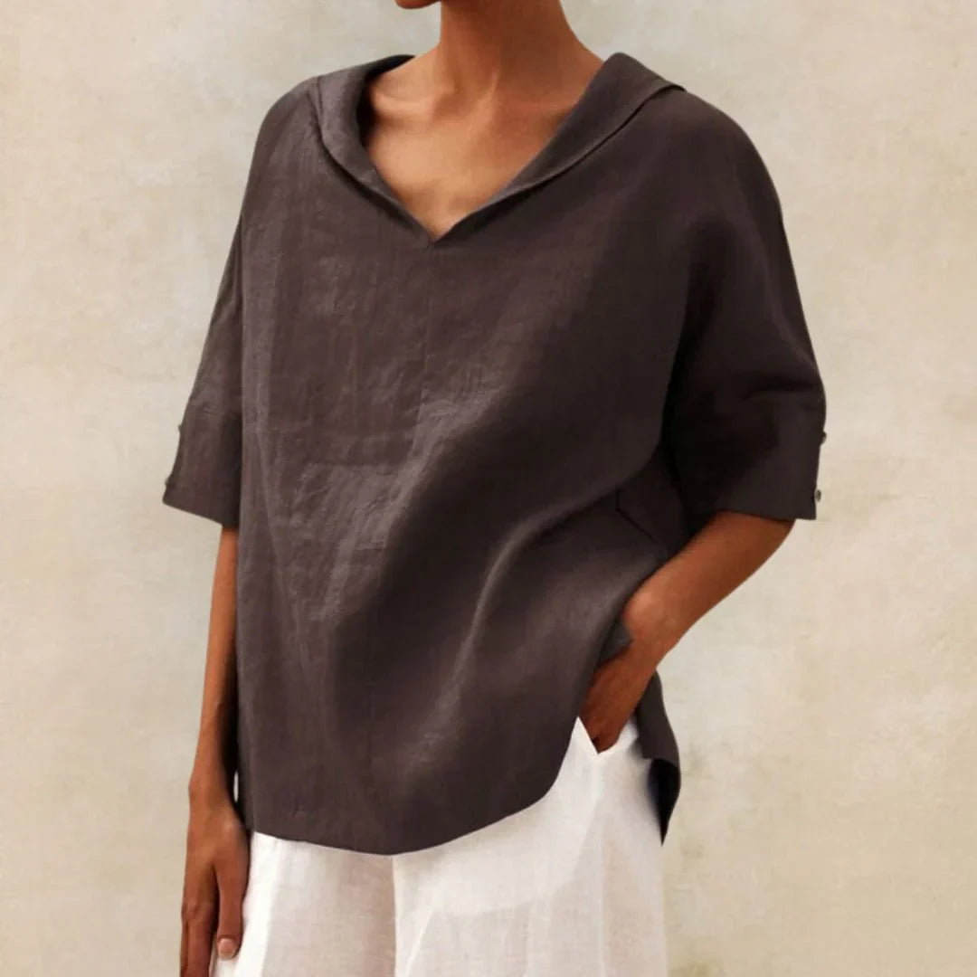 Effortless women's summer button-down shirt, a stylish long sleeve casual top for versatile everyday fashion.