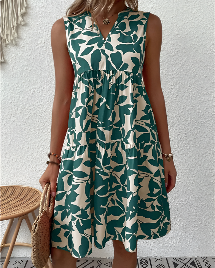 Women's effortless summer midi dress with V-neck, button-front, and relaxed fit. Perfect casual day dress.