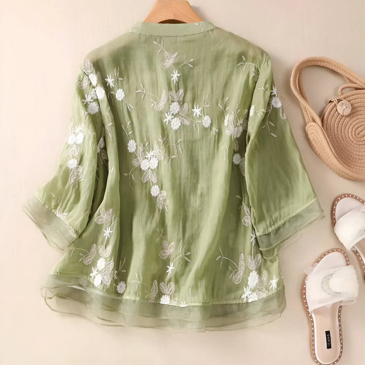 Casual women's summer top, tummy-skimming for a relaxed, comfortable and chic look.