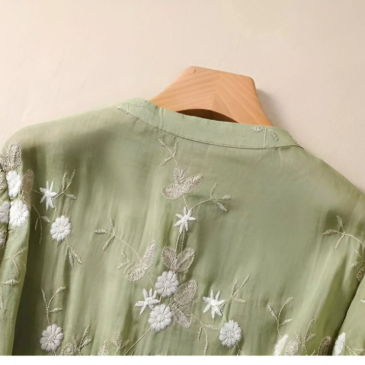 Flattering women's short-sleeve top, tummy-skimming for an effortless, chic summer look.