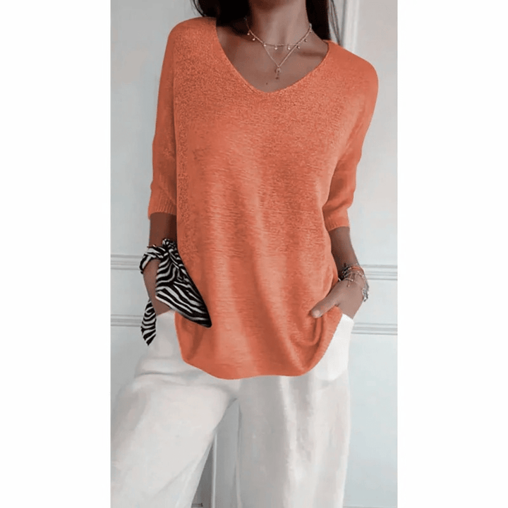 Women's comfortable 3/4 sleeve top, V-neck, relaxed fit, perfect for casual everyday outfits.