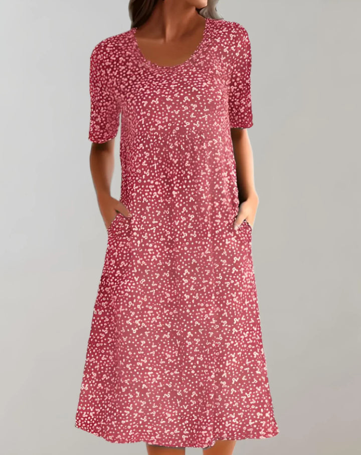 Comfortable women's sleeveless flowy V-neck dress. Ideal casual summer wear for any occasion.