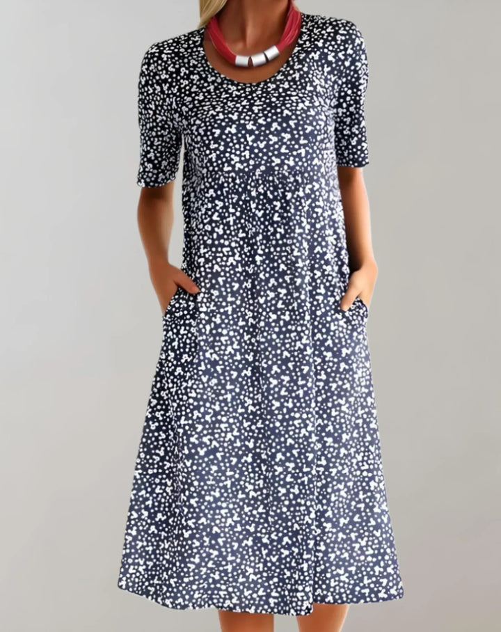 Versatile women's flowy V-neck summer dress. Effortless style for casual outings or vacation wear.