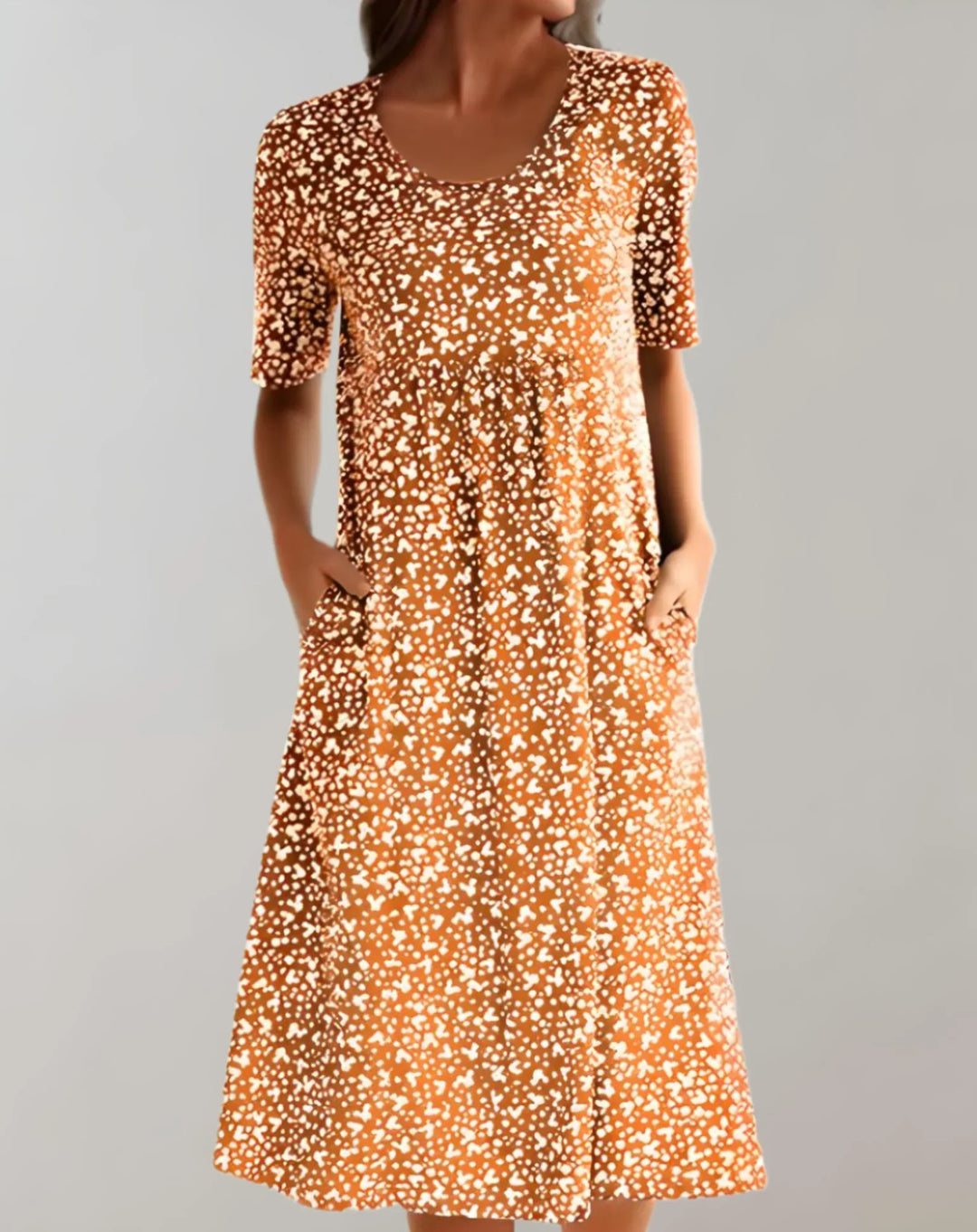 Women's V-neck flowy summer vacation dress. Effortless, comfortable, and stylish for sunny days.