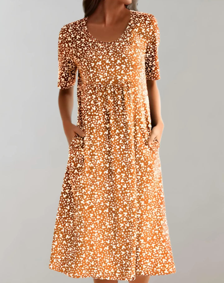 Women's V-neck flowy summer vacation dress. Effortless, comfortable, and stylish for sunny days.