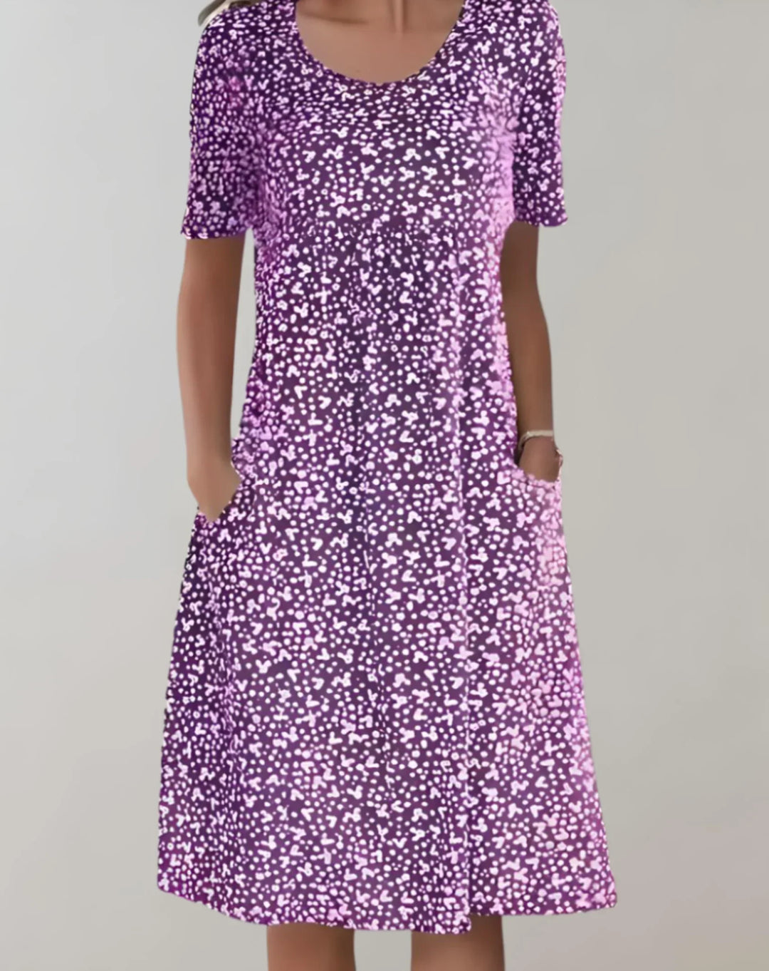 Effortless women's sleeveless V-neck summer dress. Flowy design for ultimate casual comfort & style.