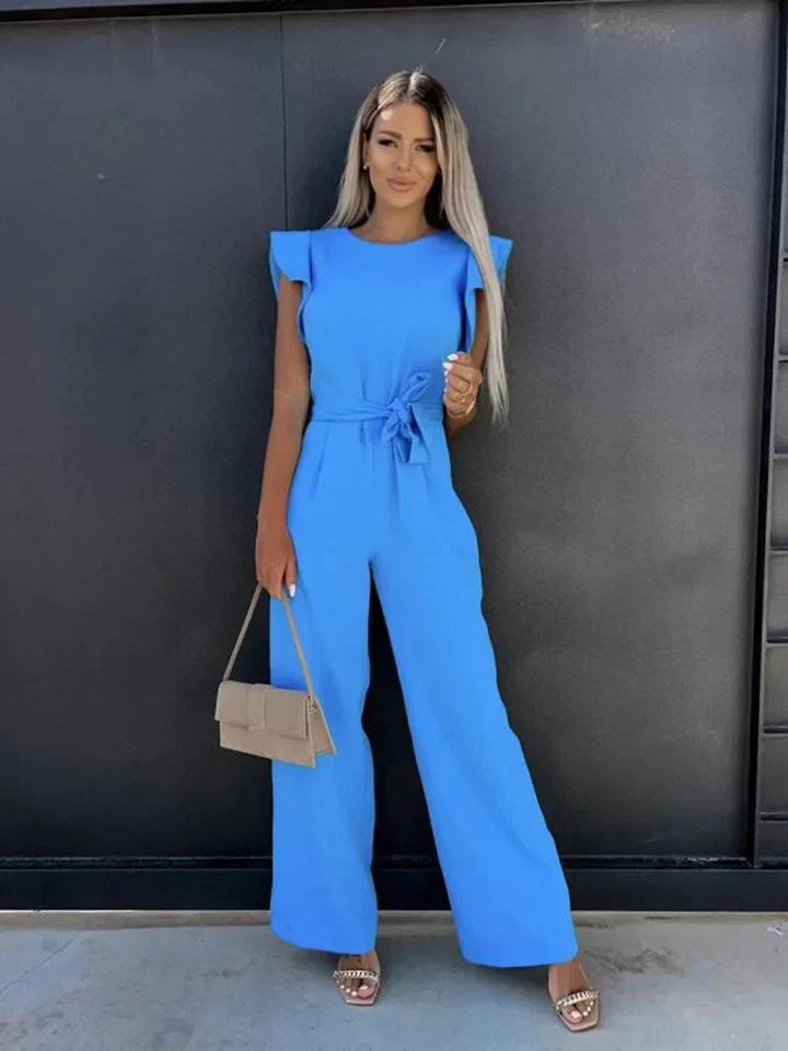 Women's effortless wide leg jumpsuit with a chic tie waist. Perfect for spring & summer comfort.