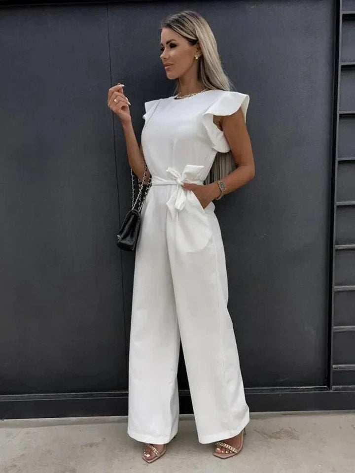 Elegant women's wide leg jumpsuit featuring a stylish tie waist. Ideal for spring fashion & summer outfits.