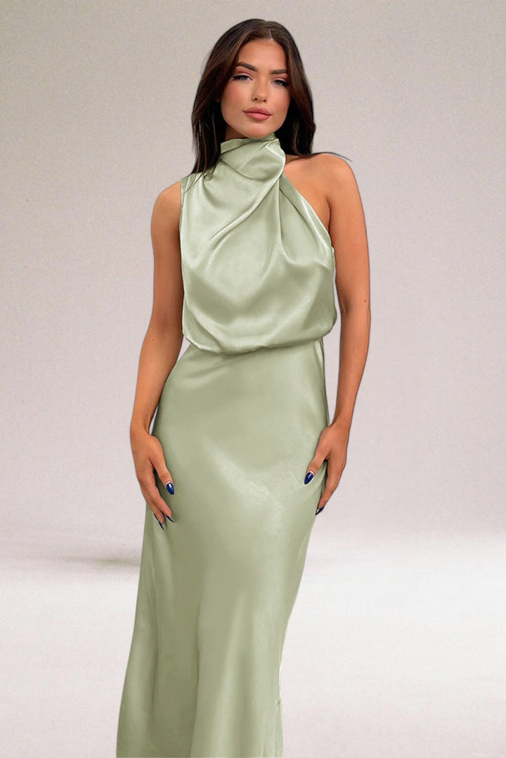 Women's Elara elegant flowing evening gown with a sophisticated halter neck. Perfect for special occasions.