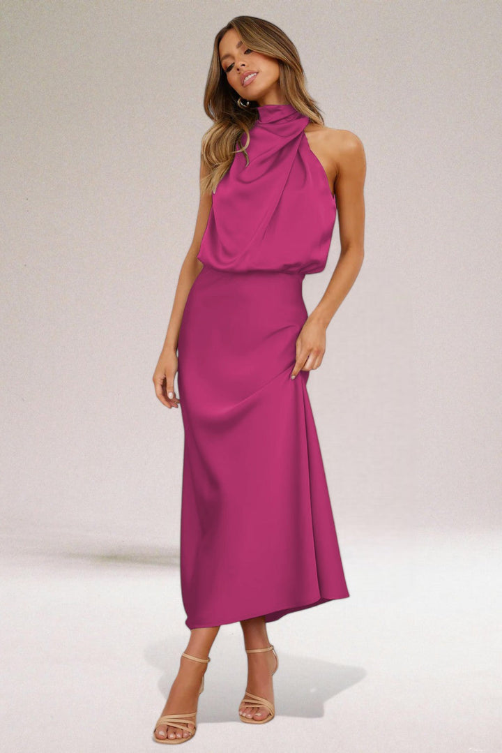 Women's Elara elegant halter neck evening dress with a beautiful flowing silhouette. Ideal for formal parties.
