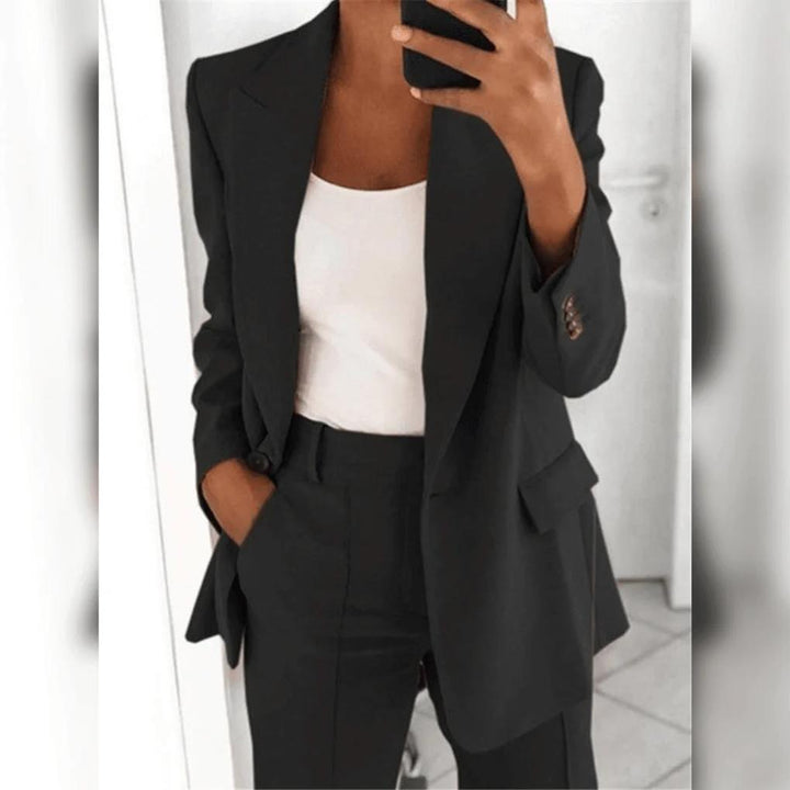 Women's elegant 2-piece suit set with blazer & tailored pants for formal events or professional business attire.