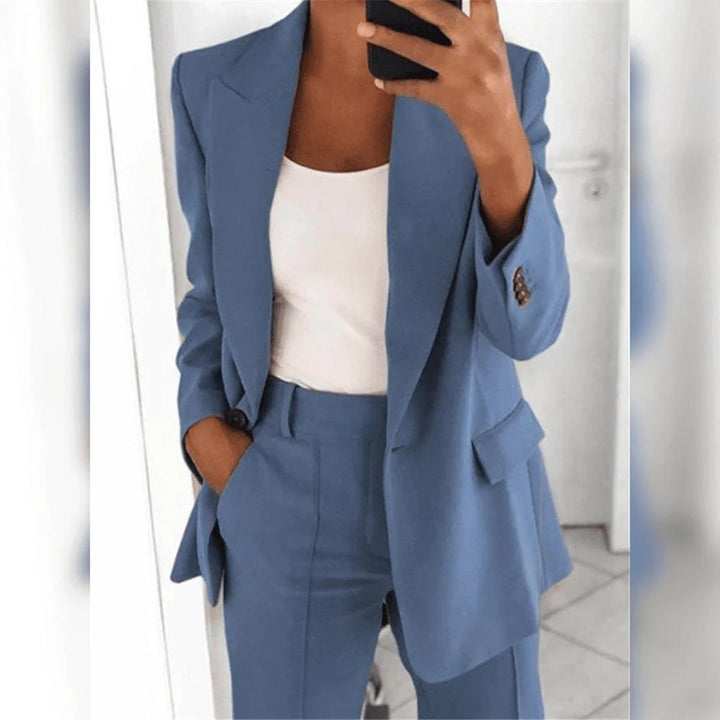 Polished women's pant suit, a sophisticated two-piece set perfect for office wear & professional fashion.