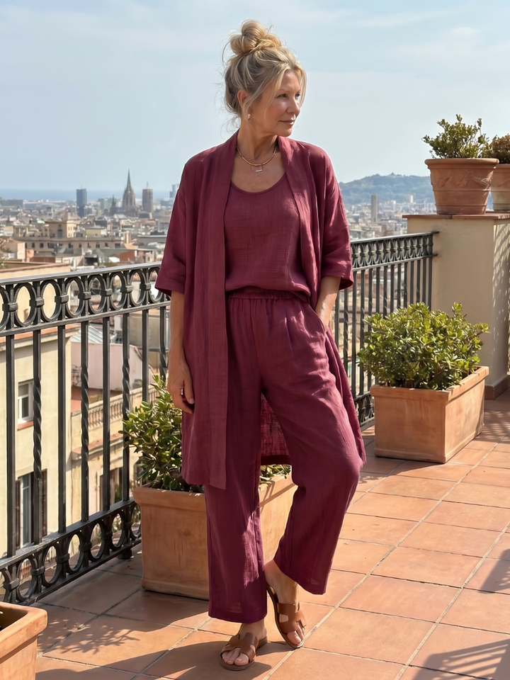 Women's fashionable 3-piece set: longline cardigan, wide-leg pants, and a sleeveless top for elegant style.
