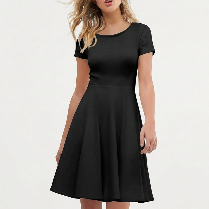 Women's elegant A-line summer dress with charming bow detail. Perfect short sleeve casual or party dress, above knee.