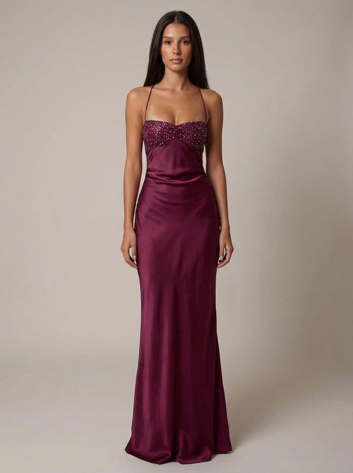 Elegant floor-length beaded halter dress for women. Ideal evening gown for formal events, galas & proms.