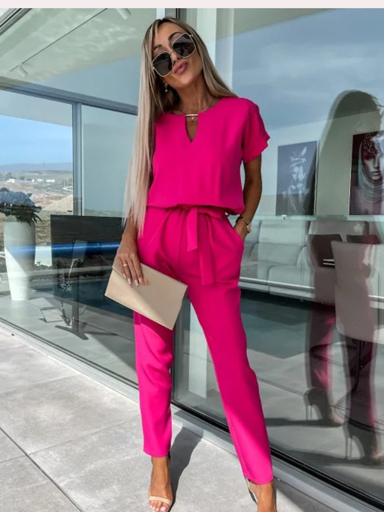Women's elegant belted wide-leg jumpsuit, perfect for a chic and comfortable fashion outfit.