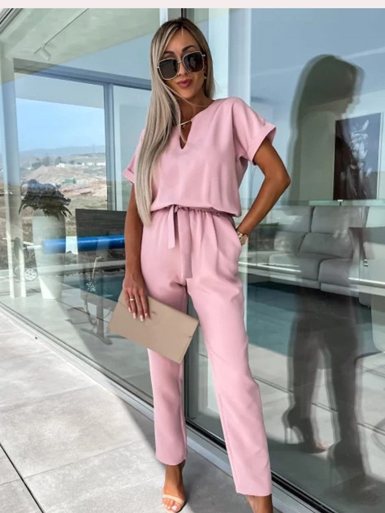 Chic women's wide-leg jumpsuit with belt, offering effortless style and versatility for any occasion.