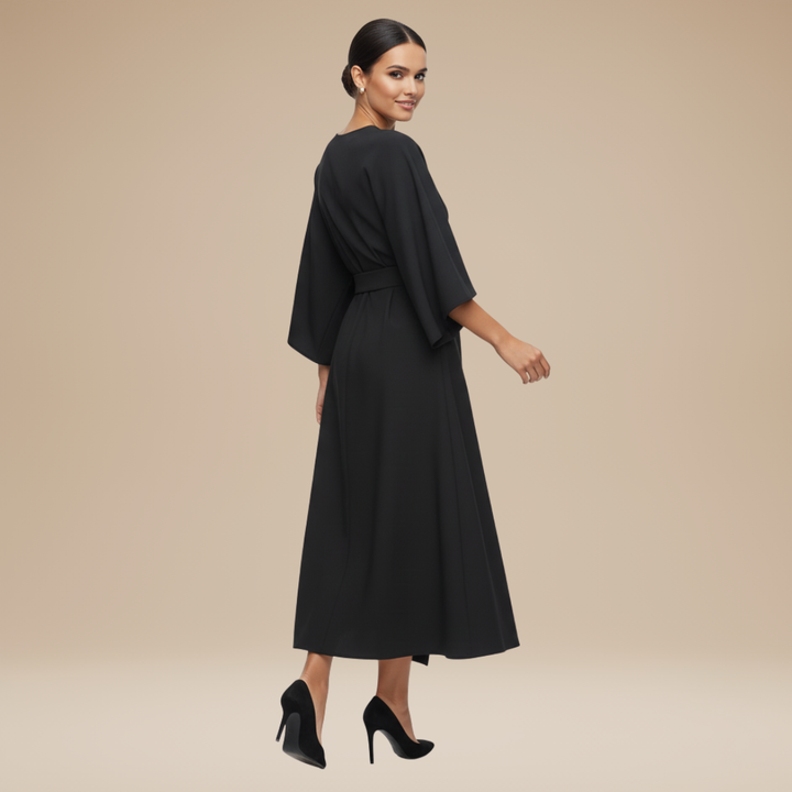 Chic women's long sleeve wrap midi dress from the back, elegantly styled for special formal events.