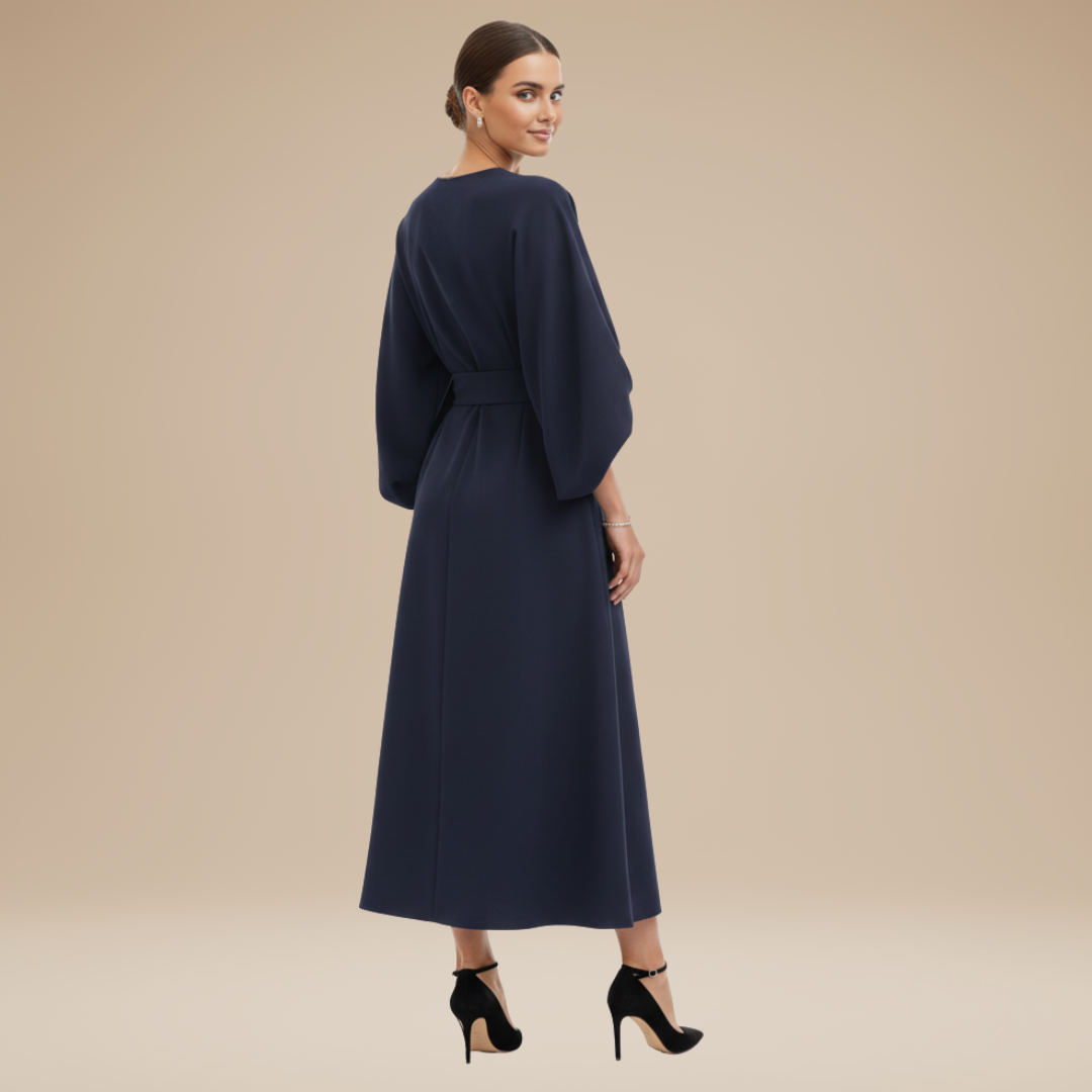 Side profile of an elegant women's long sleeve wrap midi dress, with flowing wide sleeves, ideal for formal wear.