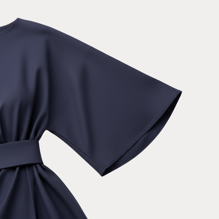 Detail shot of the wide, long sleeve on a sophisticated women's wrap midi dress, perfect for formal events.