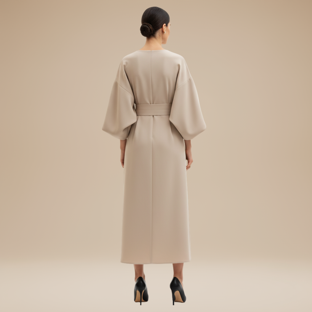 Women's sophisticated belted wide sleeve wrap midi dress, styled with accessories for a chic party look.