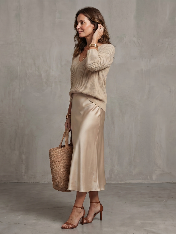 Matching women's set: elegant bias midi skirt & long sleeve V-neck top. Perfect fall layering.