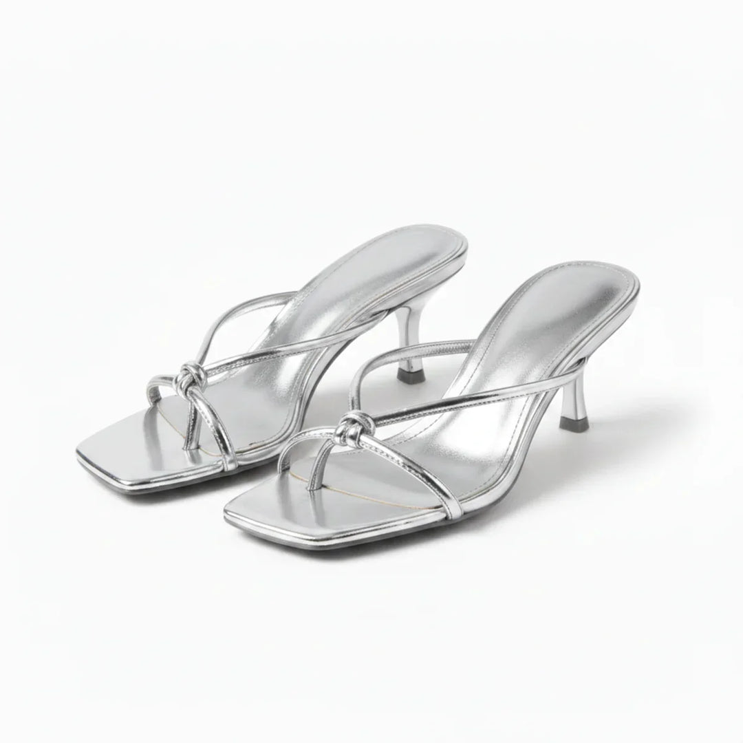 Chic women's elegant knot heeled sandals, a stylish and comfortable slip-on choice for summer fashion.