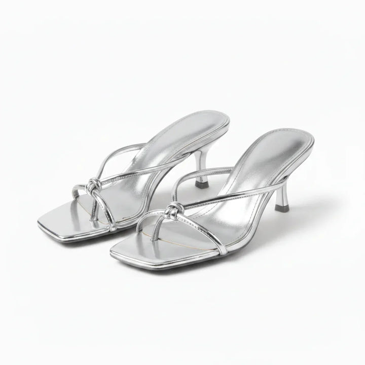 Chic women's elegant knot heeled sandals, a stylish and comfortable slip-on choice for summer fashion.