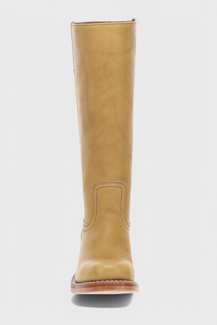 Stylish women's knee-high boots with comfortable heel, offering versatile and chic design.