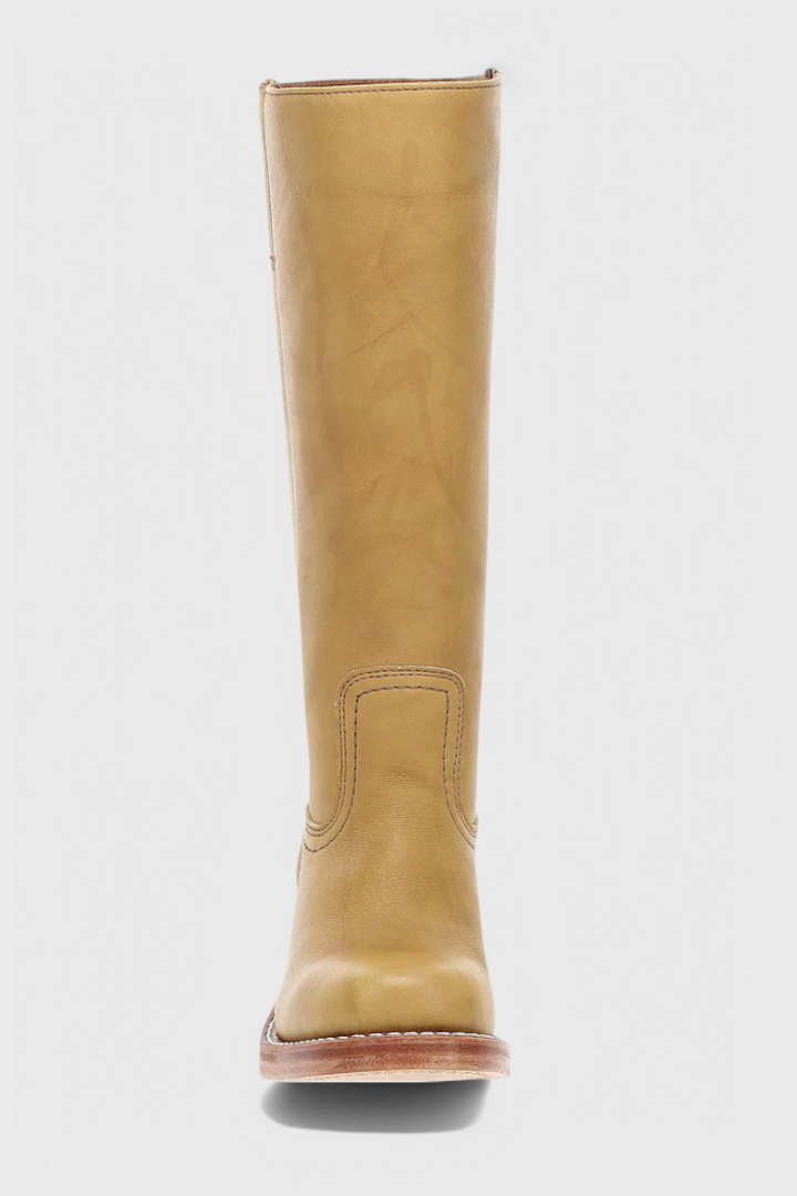 Stylish women's knee-high boots with comfortable heel, offering versatile and chic design.