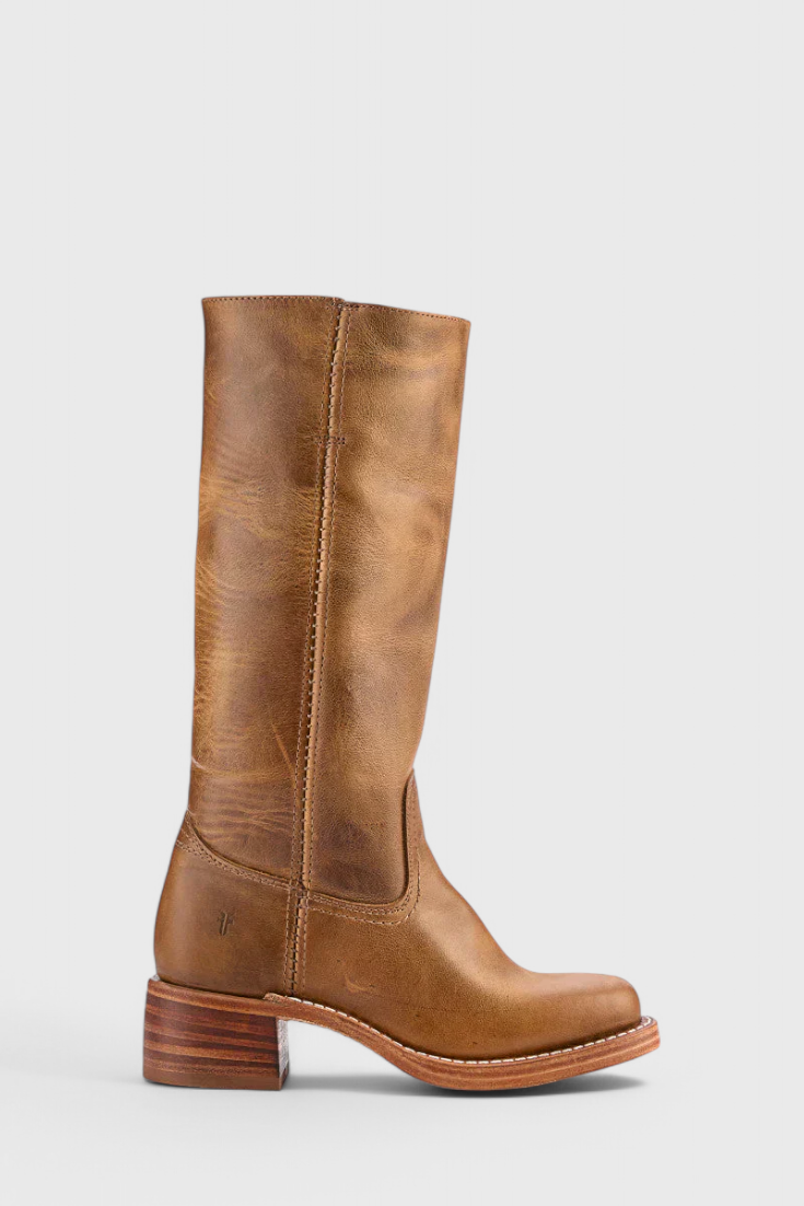 Women's long black heeled boots, knee-high and elegant, ideal for cool weather and events.